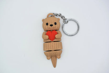 Knitted Articulated Otter With Heart - image 2
